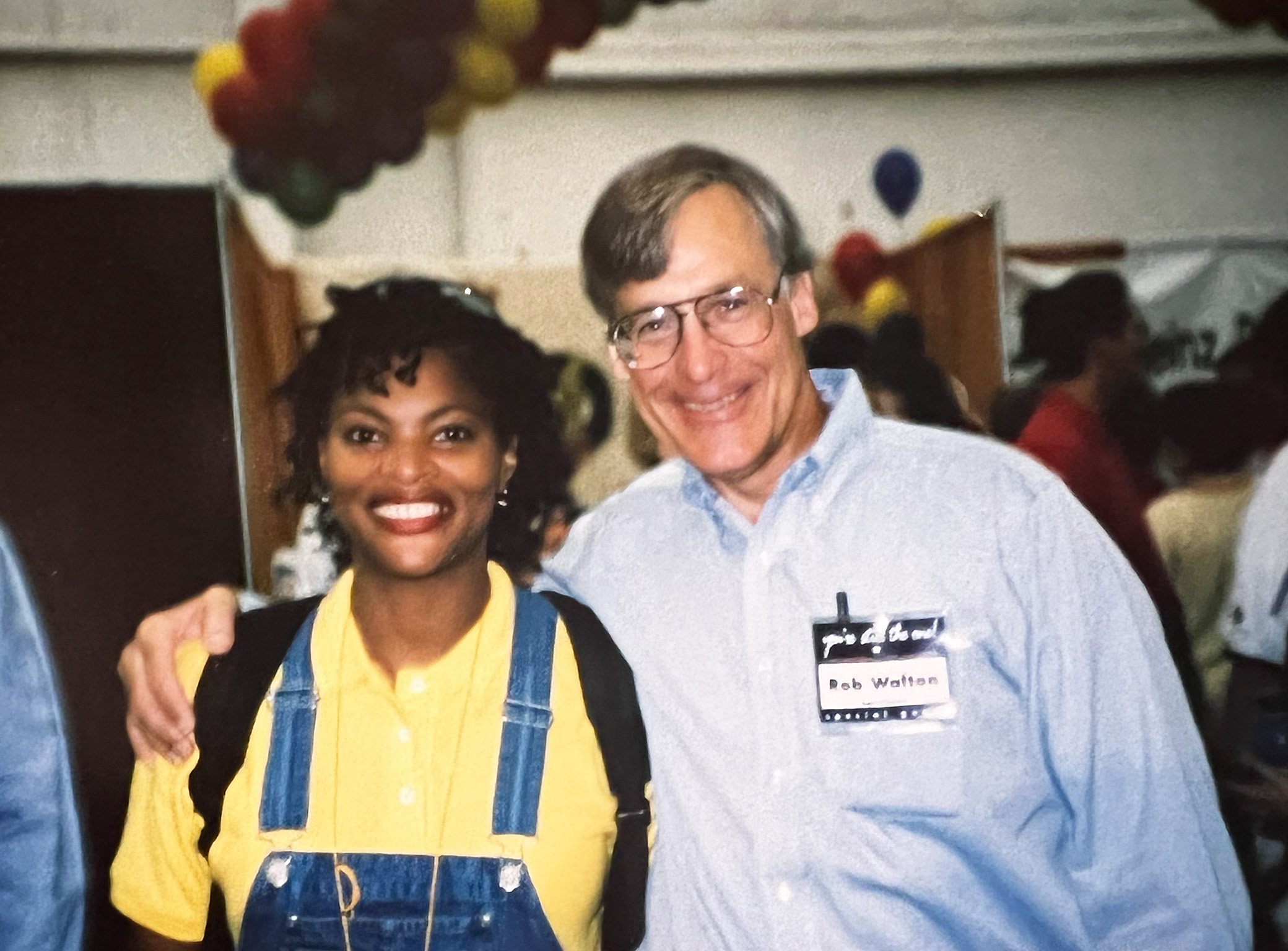 A young Kay Rockwell poses with Rob Walton during a past Associates Week.