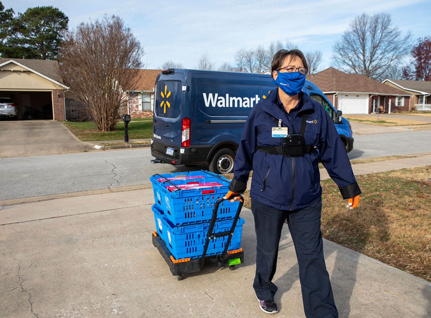 Kathleen brings an InHome delivery from her truck to a customer's home.