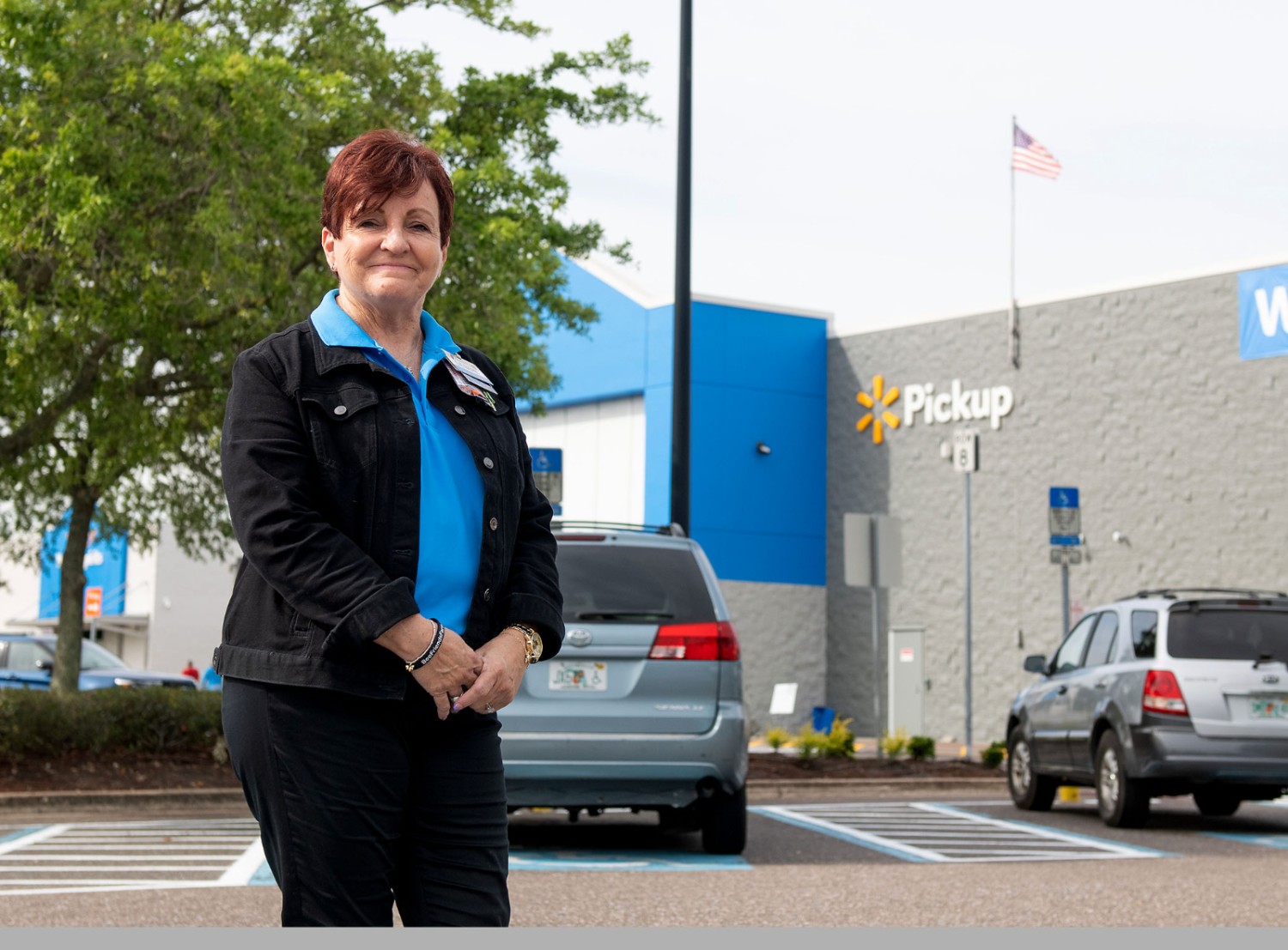 Debbie Lovelady stands outside a Walmart store.