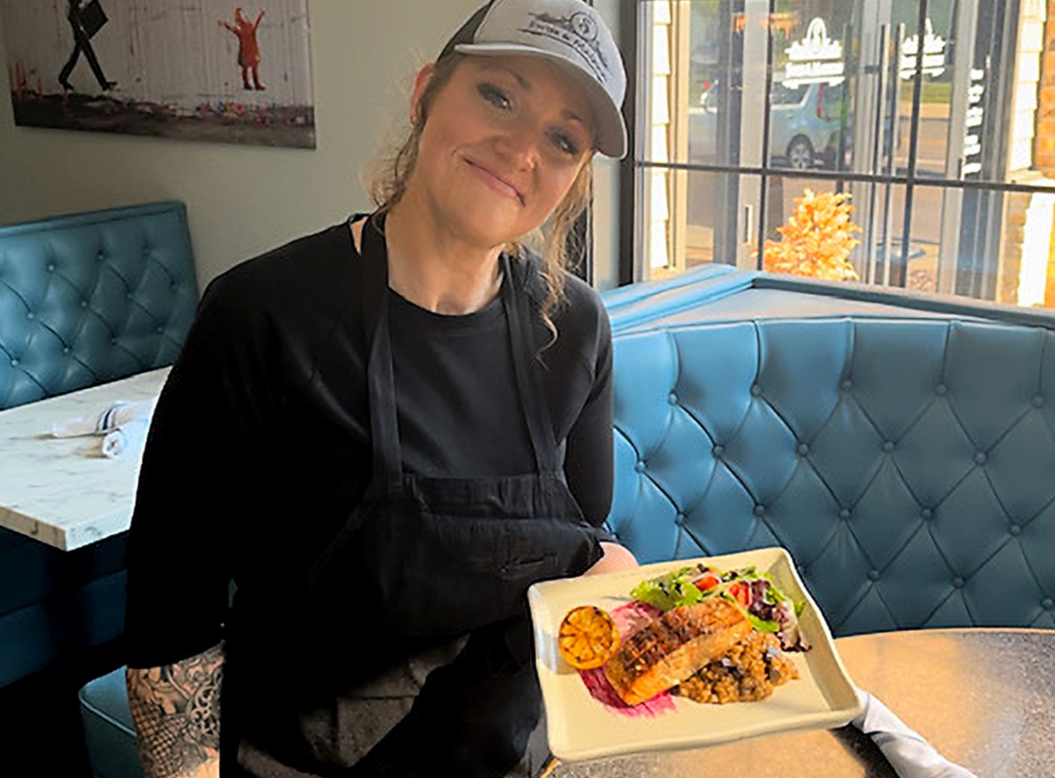 Chandra poses with a healthy meal she prepared.