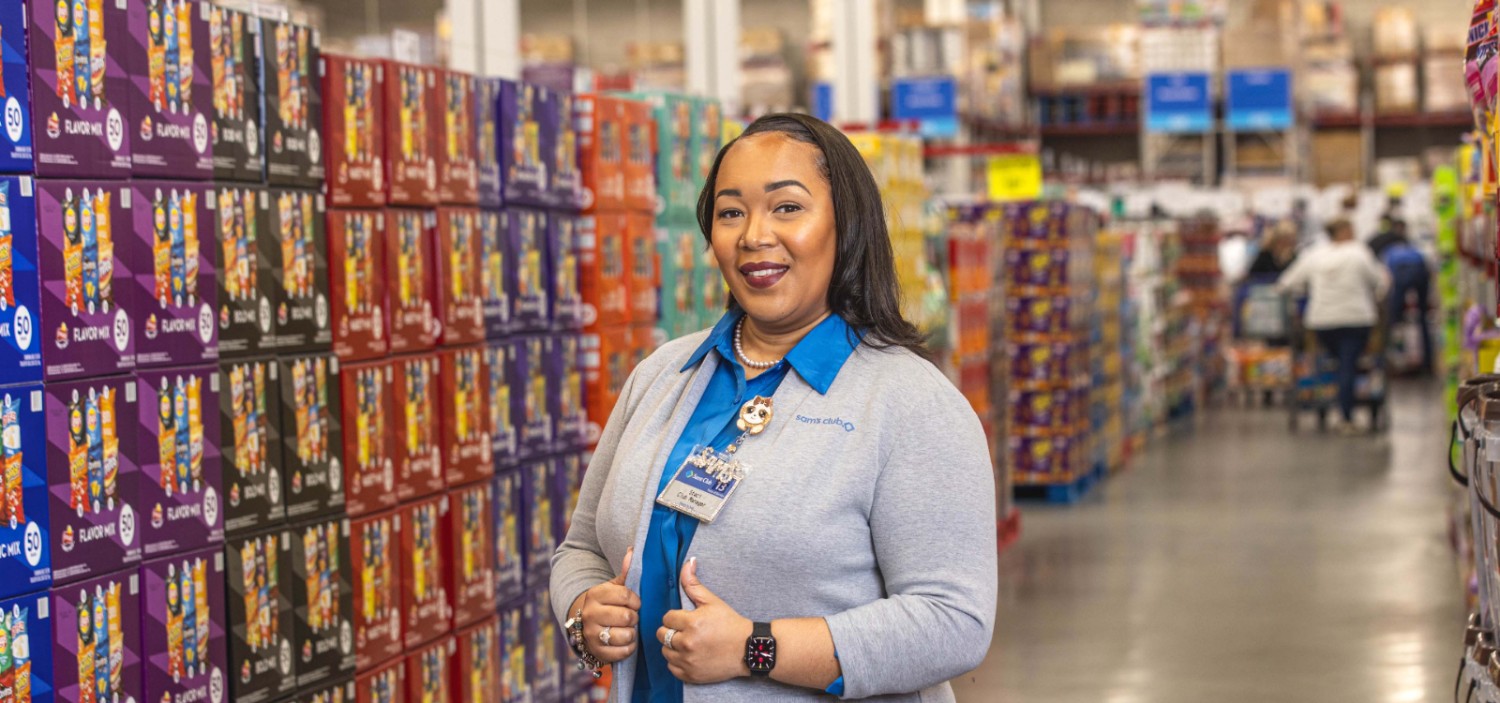 Female associate in the chip aisle of a Sam's Club