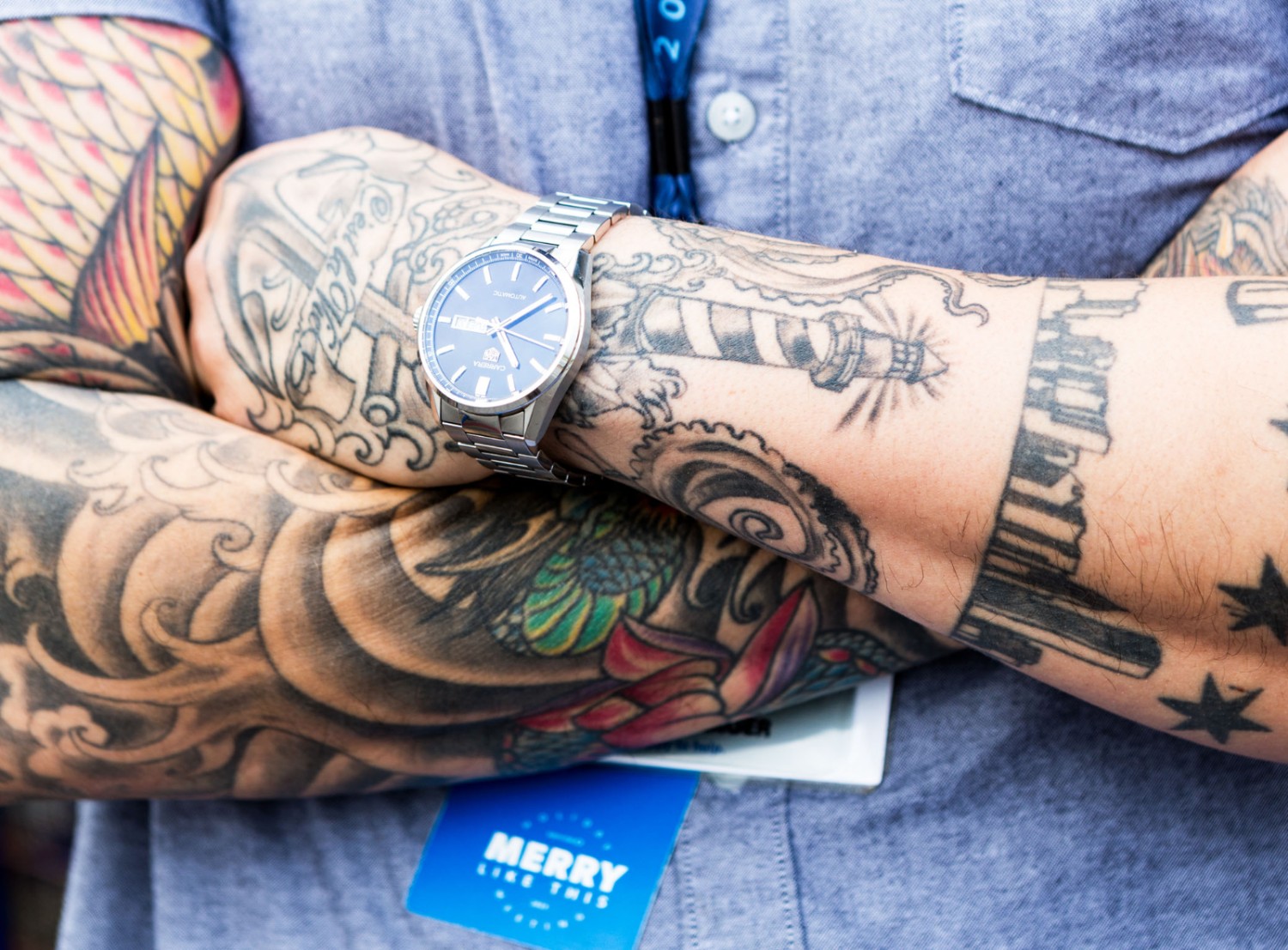 A close up photo of Chico Montenegro's arm tattoos