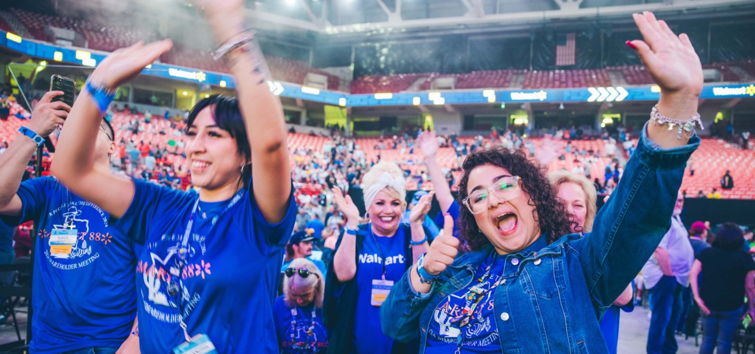 group of associates cheering