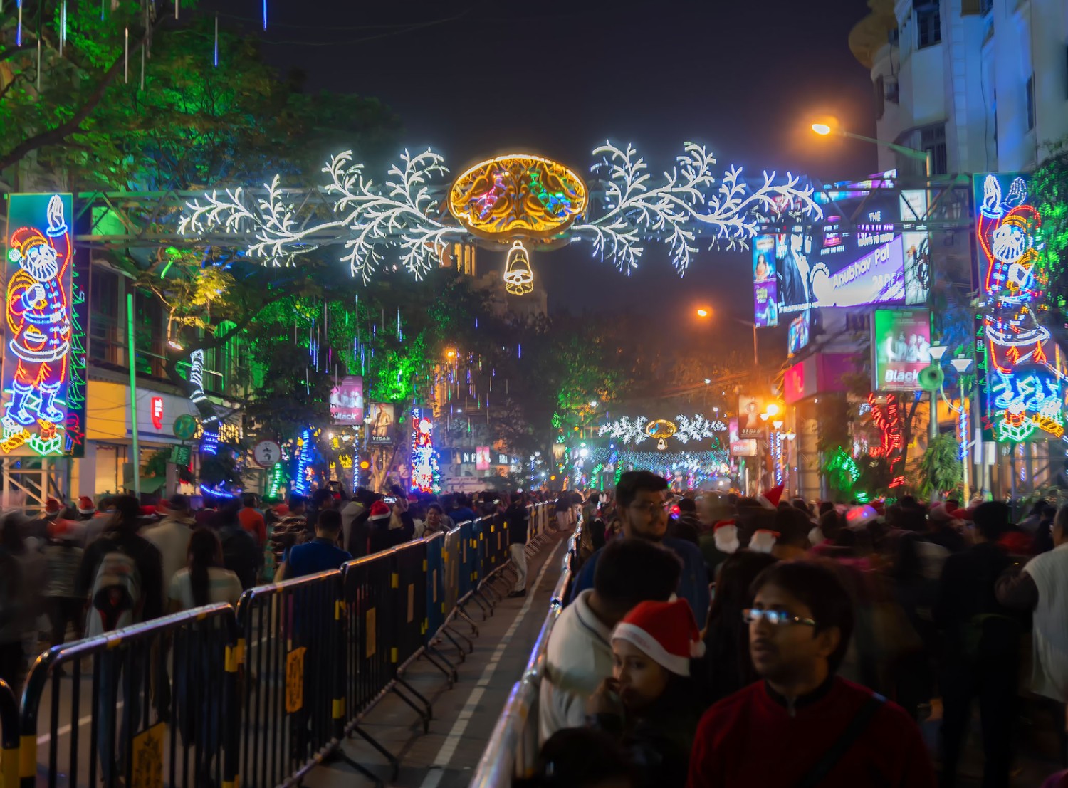 A blue globe is outlined with holiday icons and snowflakes.