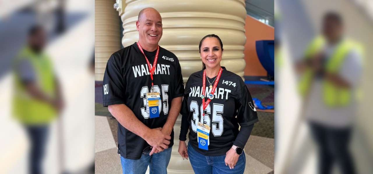 evin Ladek (left) and Otilia Condie (right) wear Walmart Store 4325 jerseys and smile.